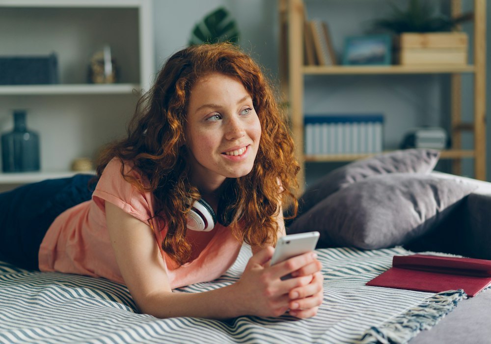 Woman reading on her phone